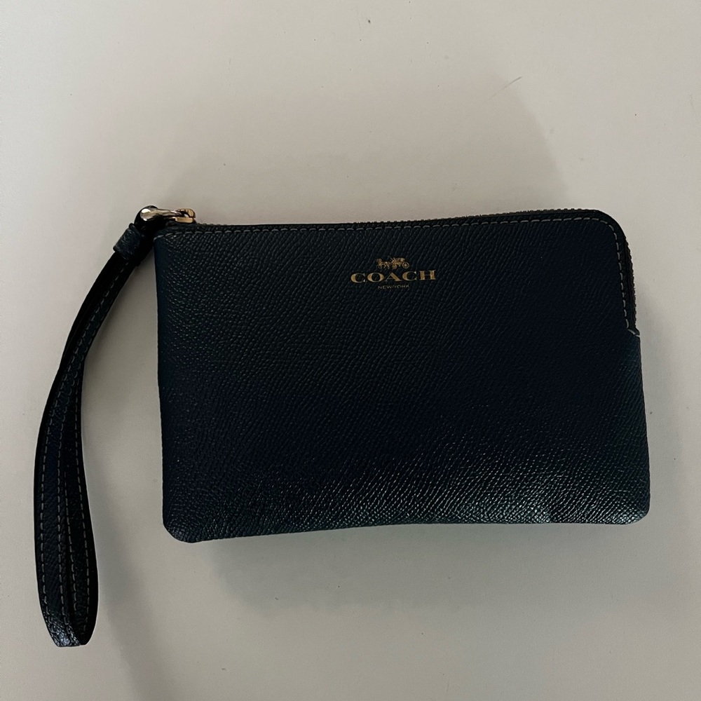 Brand new Coach wristlet never used